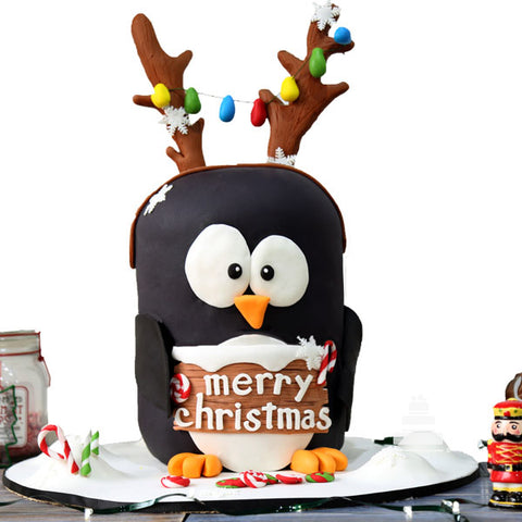 Penguin Lights, pastel de pingüino navideño