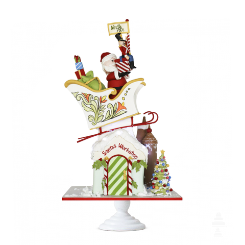 Santa Topsy Turvy Cake, en trineo con regalos